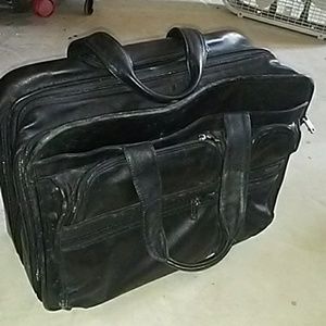 TUMI  leather laptop briefcase carry on bag